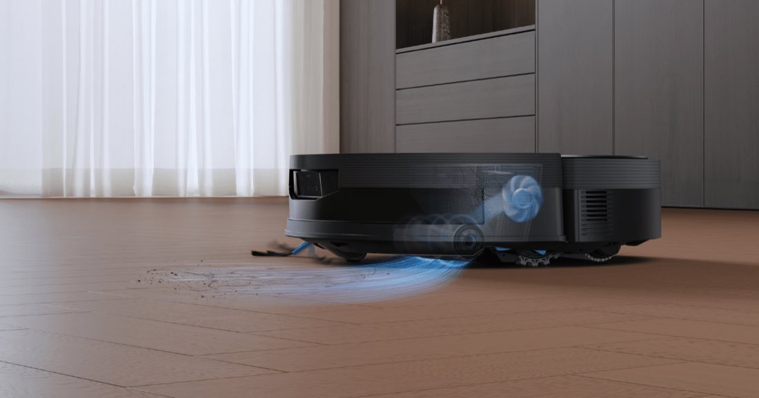 Ecovacs Deebot T90 Pro Omni vacuuming and mopping a hardwood floor with 30,000Pa BLAST suction