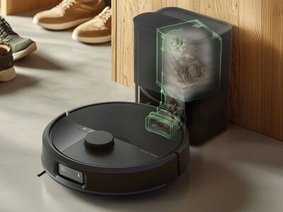 Roomba Max 705 Vac AutoEmpty dock in a dark room — LiDAR mapping at night