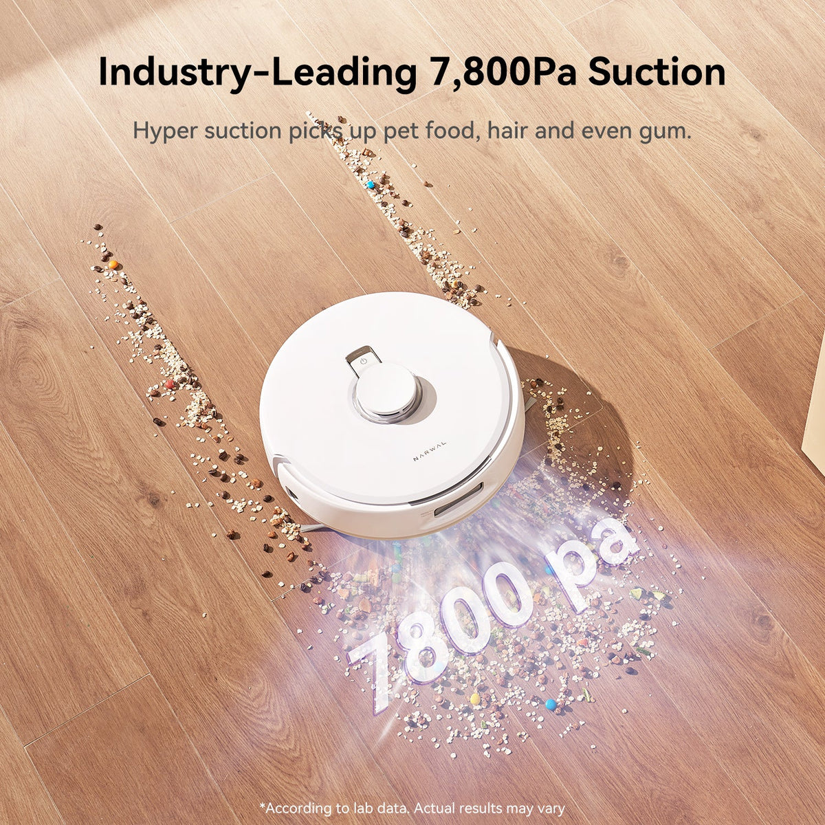 Narwal Freo X Plus 7800Pa suction picking up pet food crumbs and debris on hardwood floor