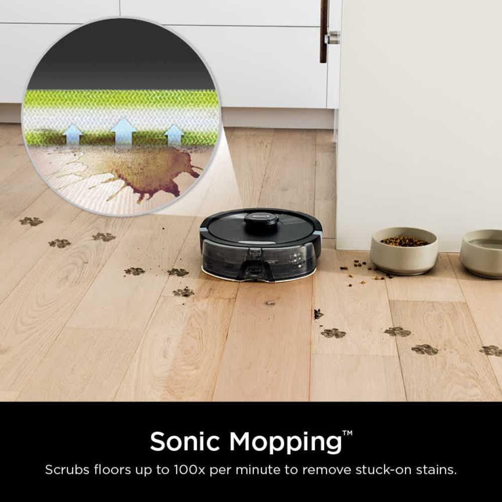 Shark Matrix Plus Sonic Mopping scrubbing a dried stain on hardwood